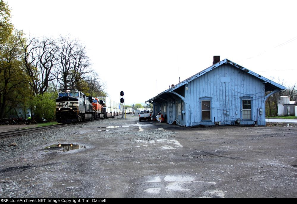 NS 9758 leads NS 265 by the old depot.